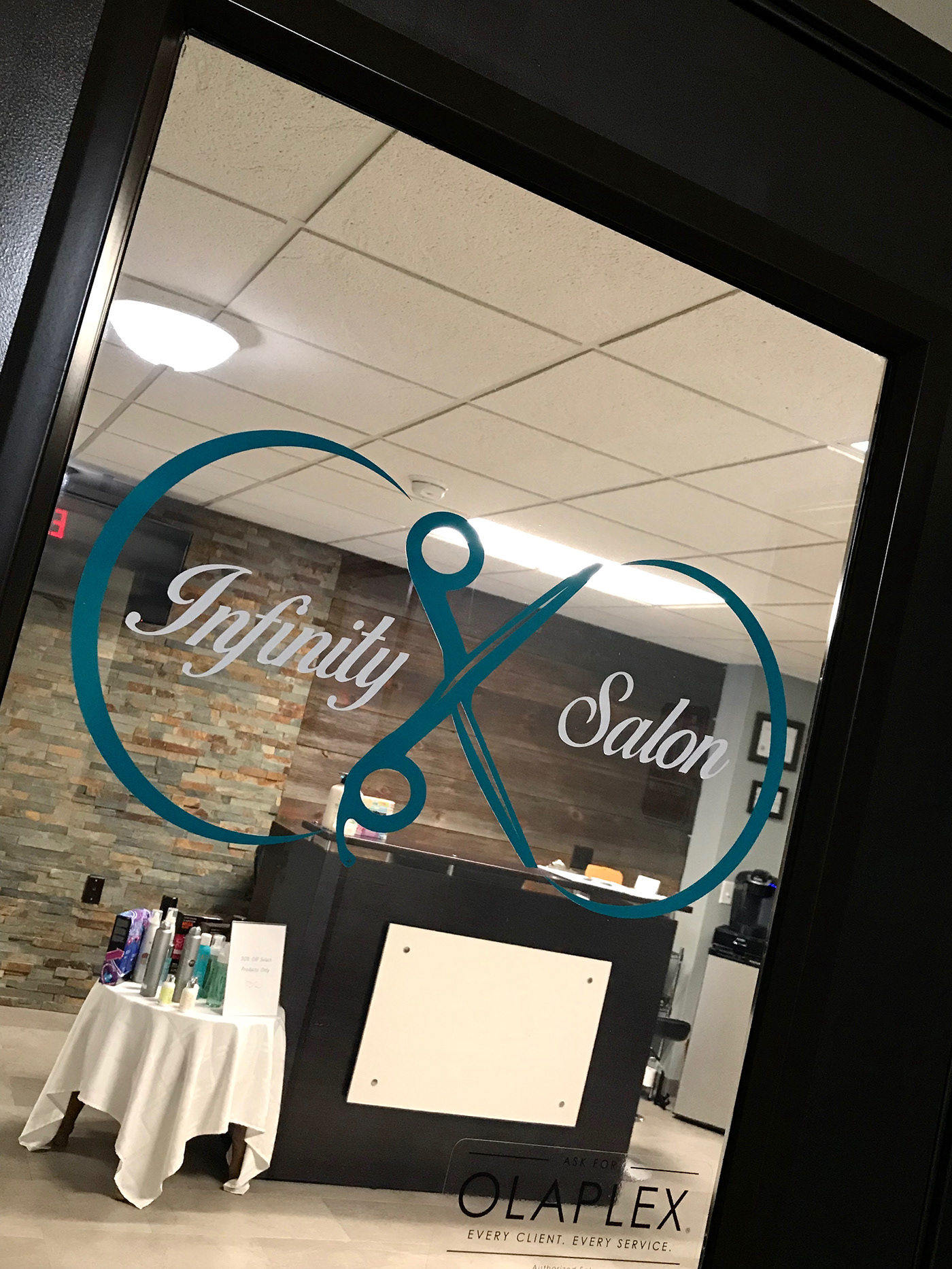 Infinity Salon logo