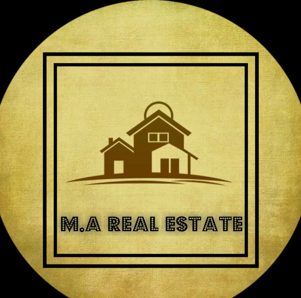 M A Real Estate & Builders logo