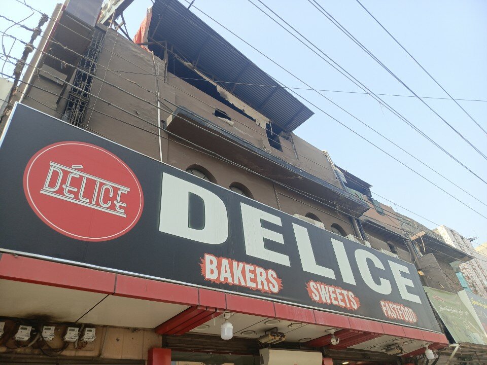 Delice Bakers & Sweets logo
