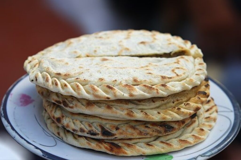 Hunza Cuisine logo